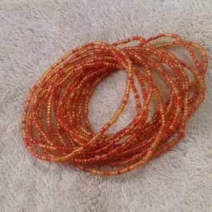 Stack of seed bead bracelets